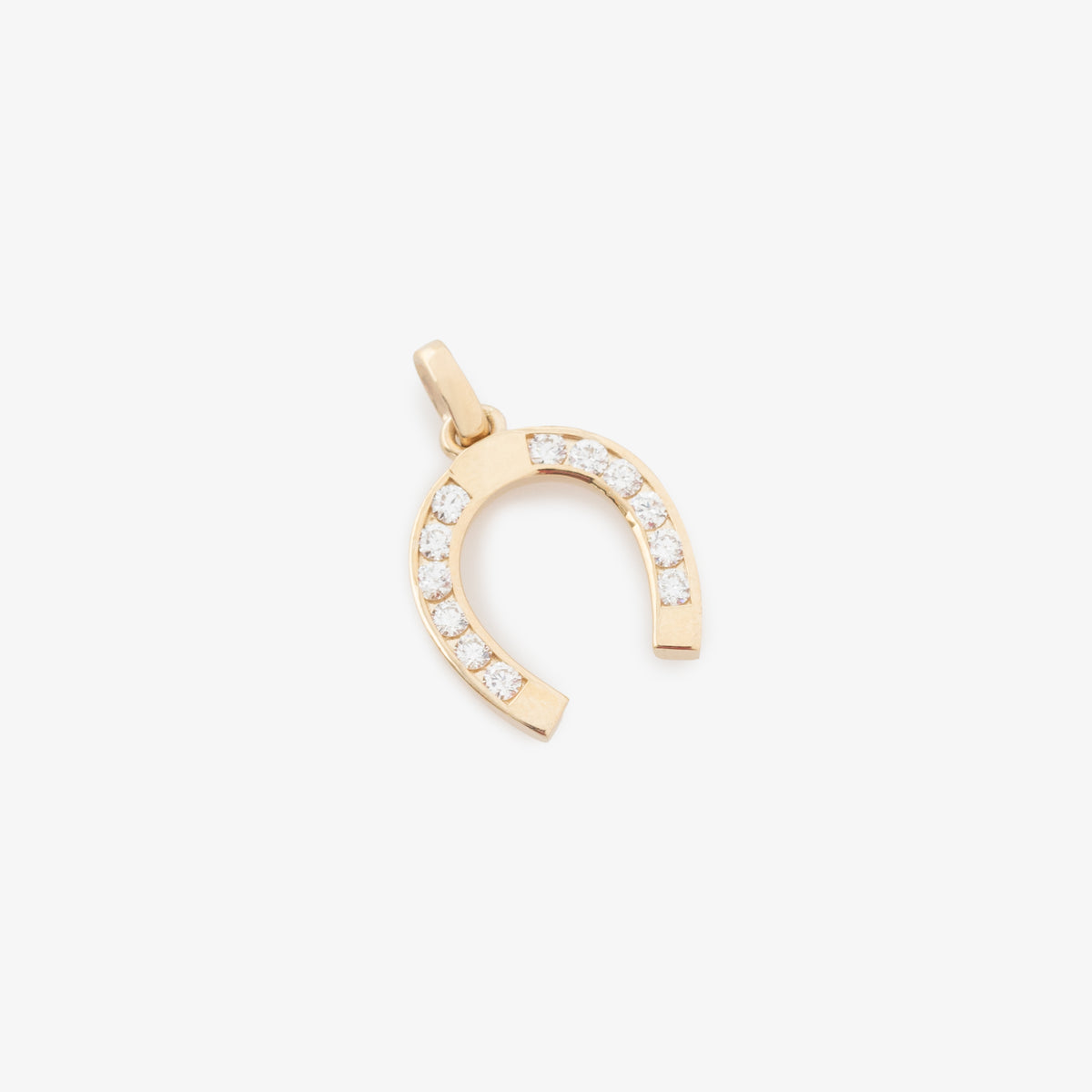 Diamond Horseshoe Pendant at AimeLeonDore
